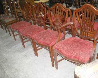 Hepplewhite shield back mahogany chairs. 2 Captain & 6 side chairs. Very good condition.
