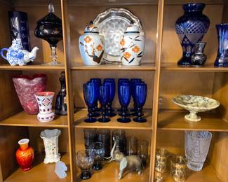 Czech glass in deep red and cobalt with many other glass, brass and pottery pieces