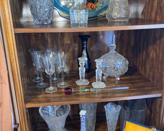 Many heavy, etched, and cut glassware pieces