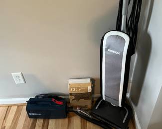 Oreck upright vacuum cleaner and hand held oreck vacuum. 