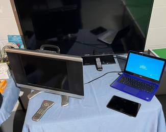 Samsung 40 inch flatscreen TV, Sharp 15 inch LCD TV w/ side bar speakers, dell laptop and Amazon nook.