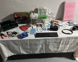 Atari Flashback 9 gold, Wii games, Wii controllers, box games, x box console,  wireless security camera, wireless keyboard and more.