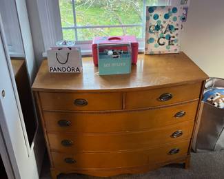 Curved front two over three Cherry Dresser.