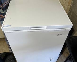 Midea like new upright freezer.