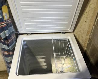 Midea upright freezer inside.