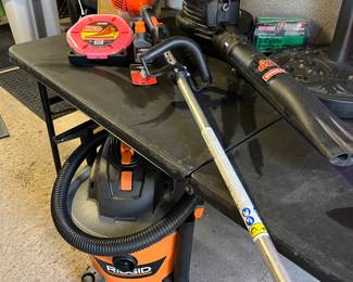 Craftsman gas blower, ridgid shop vac and echo gas weed whacker.