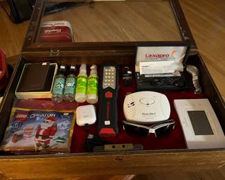 Men’s Estalon leather trifold wallet, Lego creator still in sealed package, Meyers hand sanitizer spray, everyone hand sanitizer spray, sharper  image wireless earbuds, jobsmart LED work light, master padlock, lexapro laser, first alert carbon dioxide alarm, Men’s fossil 100 meter watch and Emerson thermostat.
