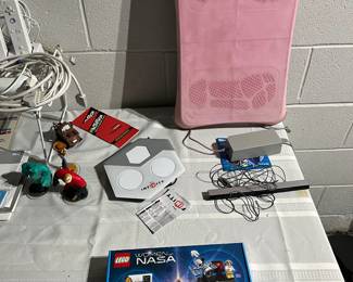 Disney infinity game, dance game and Lego Women of NASA.