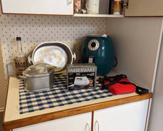 Like new air fryer, faberware mixer and covered dish set.