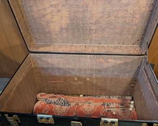 Inside view of vintage steamer trunk.
