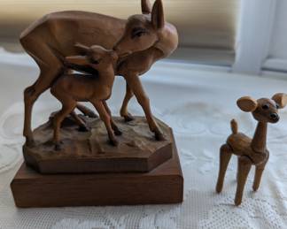 Vintage hand carved wooden Hawaiian island figurines.