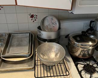 Angel food cake molds, cooling rack, strainer, soup pot with lid and baking pans.