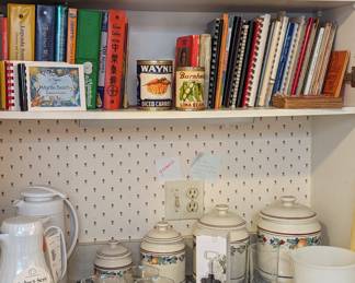 Cookbooks, decanter set, milk glass, coffee mugs and coffee decanters.
