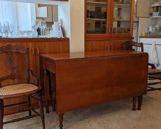 Antique cherry gate leg drop the table.