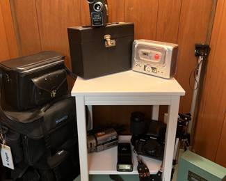 Cine Kodak model E, Kodak EasyShare printer, Sony video camera, Minolta camera with spare lens and all carrying bags.