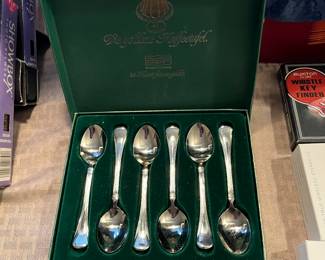 Set of vintage spoons in original case.