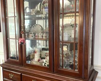 Cherry dining room set with six chairs, matching china cabinet and sideboard.