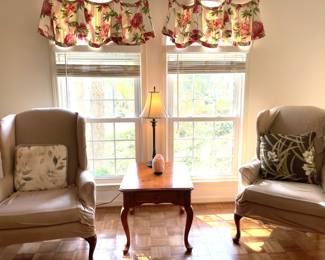 beige armchair, set of 2, and throw pillow, wood coffee table, Himalayan salt lamp, table lamp