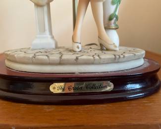 antique milk glass lantern with woman and beaded fringe.