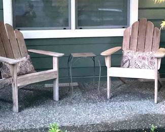 A Pair Of Wood Adirondack Chairs