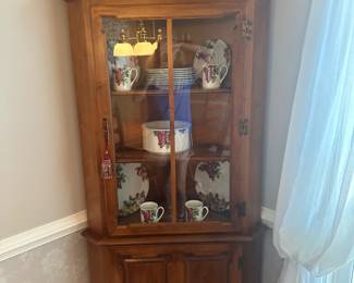 2 matching Tell City corner curio cabinets