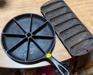 TWO CAST IRON CORN BREAD PANS