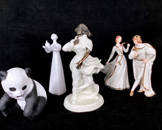 GRLE909 Vintage Fine Bone China Porcelain Figurines Minton, England fine bone China Sea Breezes 1978 figurine. Lenox Romeo & Juliet fine porcelain, 1996. &nbsp;Giant Panda Cub by Lenox, 1993, fine porcelain. &nbsp;Peace by Royal Doulton, England fine bone china1977.
