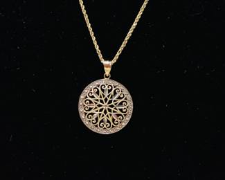 KIHE112 10k Pendant 14k Gold Rope Chain Two tone gold star center, pendant and 12 inch rope chain with very nice security clasp. Chain weighs approximately 5.15 grams & pendant about 2.20 grams.&nbsp;
