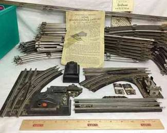 RIHI103 Vintage Gargraves Universal Trackage, Lionel Switches More Lots of tracks, some assembled pieces. Also includes a few Lionel switches, & a small assortment of accessories along with one 2.25 inch iron character.&nbsp;
