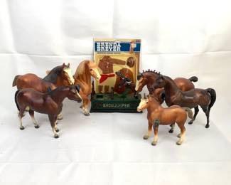 RIHI204 Vintage ShowJumper Bank And More Cast iron ShowJumper bank, 6 plastic horses made by Breyer Molding Co. And a Brenda Breyer western riding outfit.
