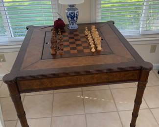 Game table middle turns over .