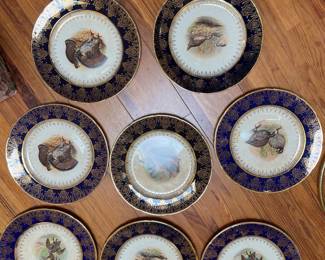 Set of 8 cobalt blue gilt game plates