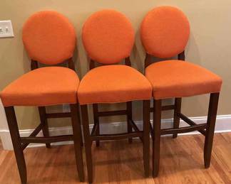 Three Orange Barstools 