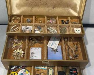 Brooches, Keychains in jewelry box