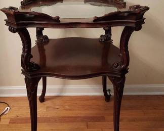 Hand Carved Mahogany End Table with Round Glass Insert