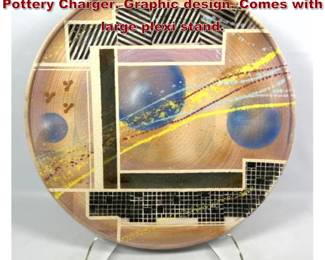 Lot 1830 28 Dia Large Artisan Studio Pottery Charger. Graphic design. Comes with large plexi stand. 