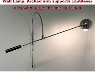 Lot 1916 ROBERT SONNEMAN Chrome Arm Wall Lamp. Arched arm supports cantilever arm with large chrome ball shad
