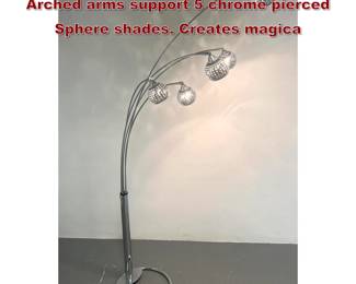 Lot 1922 Tall Modernist Chrome Floor Lamp. Arched arms support 5 chrome pierced Sphere shades. Creates magica