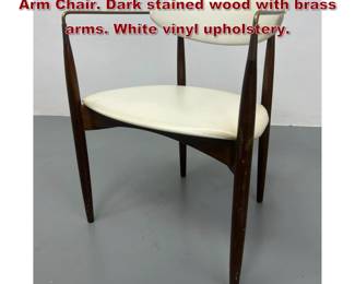 Lot 1957 DAN JOHNSON Viscount Armchair Arm Chair. Dark stained wood with brass arms. White vinyl upholstery. 