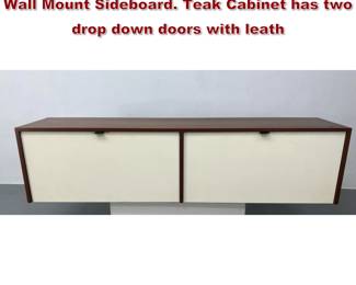 Lot 1987 FLORENCE KNOLL Walnut Floating Wall Mount Sideboard. Teak Cabinet has two drop down doors with leath