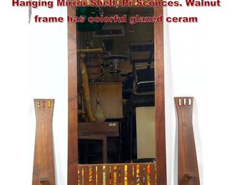 Lot 2076 3pcs American Modern Walnut Hanging Mirror Shelf, Pr Sconces. Walnut frame has colorful glazed ceram