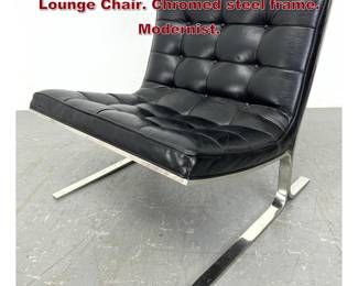Lot 2186 NICOS ZOGRAPHOS Black Leather Lounge Chair. Chromed steel frame. Modernist.