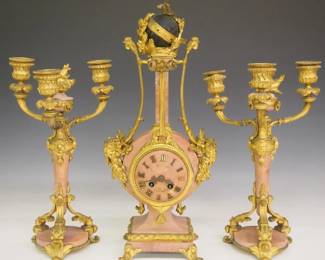 MUSEUM QUALITY VINCENTI et Cie PARIS BRONZE FRENCH MANUFACTURING SIGNED CLOCK GARNITURE CANDLEOBRA 3 PIECE SET - 19TH CENTURY. JEAN VINCENTI IS THOUGHT TO HAVE BEEN A CORSICAN WHO STARTED HIS FACTORY IN MONTBELIARD, FRANCE IN 1823. HE USED MACHINES HE HAD INVENTED TO PRODUCE "ROULANTS" (MOVEMENTS) FOR CLOCKS & WATCHES. HIS BUSINESS GREW & BY 1855 THE COMPANY HAD SIGNIFICANT SUCCESS AND WON SEVERAL AWARDSAT PARIS EXHIBITIONS.