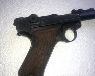 CLOSE UP VIEW OF GERMAN LUGAR HANDLE GERMAN LUGAR 7 & 7/8" BARREL 4 DIGIT SERIAL NUMBER 1602 - WORLD WAR 2 - MUST HAVE GUN PERMIT - REMOVED FROM GALLERY EACH NIGHT