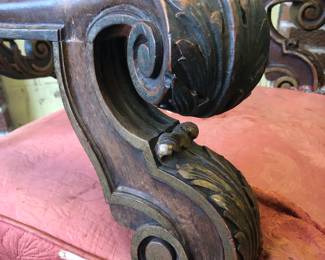 CLOSE UP VIEW OF HIGHLY CARVED ARM SIDE VIEW OF A HIGHLY CARVED AMERICAN ROCOCO LAWRENCE FISHER LENOX AVENUE DETROIT RESIDENCE. THIS IS THE ORIGINAL CHAIR IN OUR PHOTOGRAPH OF MOTHER MRS. FISHER SEATED WITH HER SEVEN (7) FISHER SONS TAKEN AT LAWRENCE FISHER'S RESIDENCE CIRCA 1931.