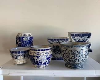 Assortment of blue and white ceramic planters