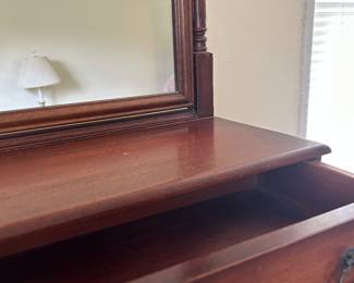 This is small Mirror and small cabinet with open drawer. Can sit on top of Dresser, table or Cabinet. Very nice piece $ 175.00