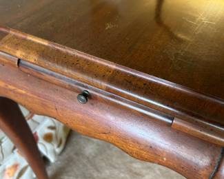 Side table has pull out shelf on each side. $ 95.00