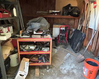 Full garage, shed and workshop.