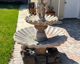 Fountain, statuary, patio furniture and yard art.